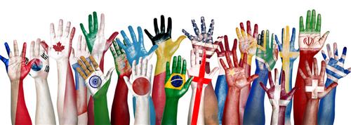 Diverse hands with flags 